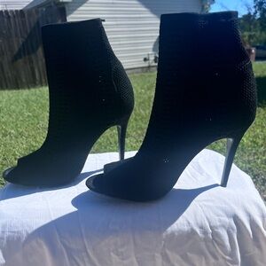 Black open toe knit high heel mid boot. Size women’s 10